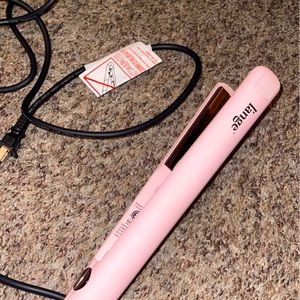 Lange hair straightener never used paid $150 for it